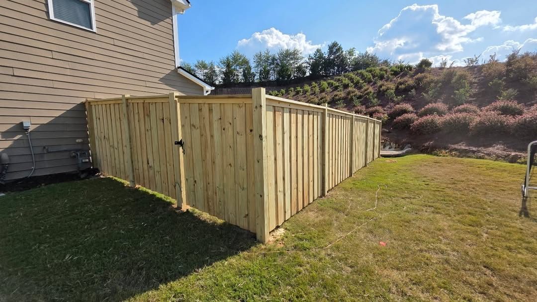 Cap-and-trim wood privacy fence