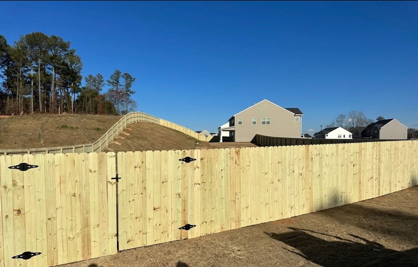 Dog-ear privacy with gate on grade