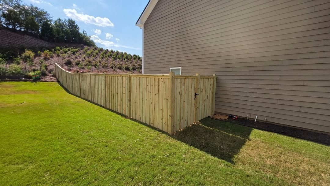 Wood privacy stepped down a slope